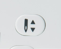 Botão de posição da agulha para cima/para baixo