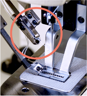 Needle thread clamping mechanism